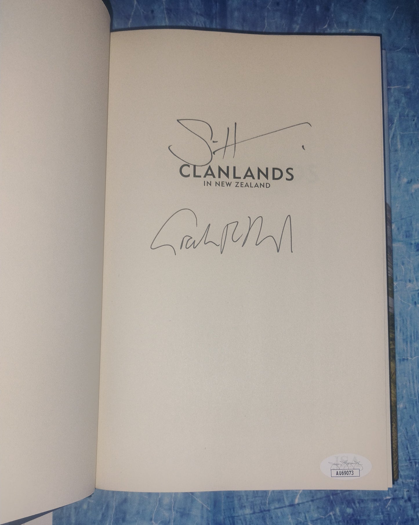 Sam Heughan & Graham McTavish Hand Signed Autograph Clanlands Book JSA COA Outlander